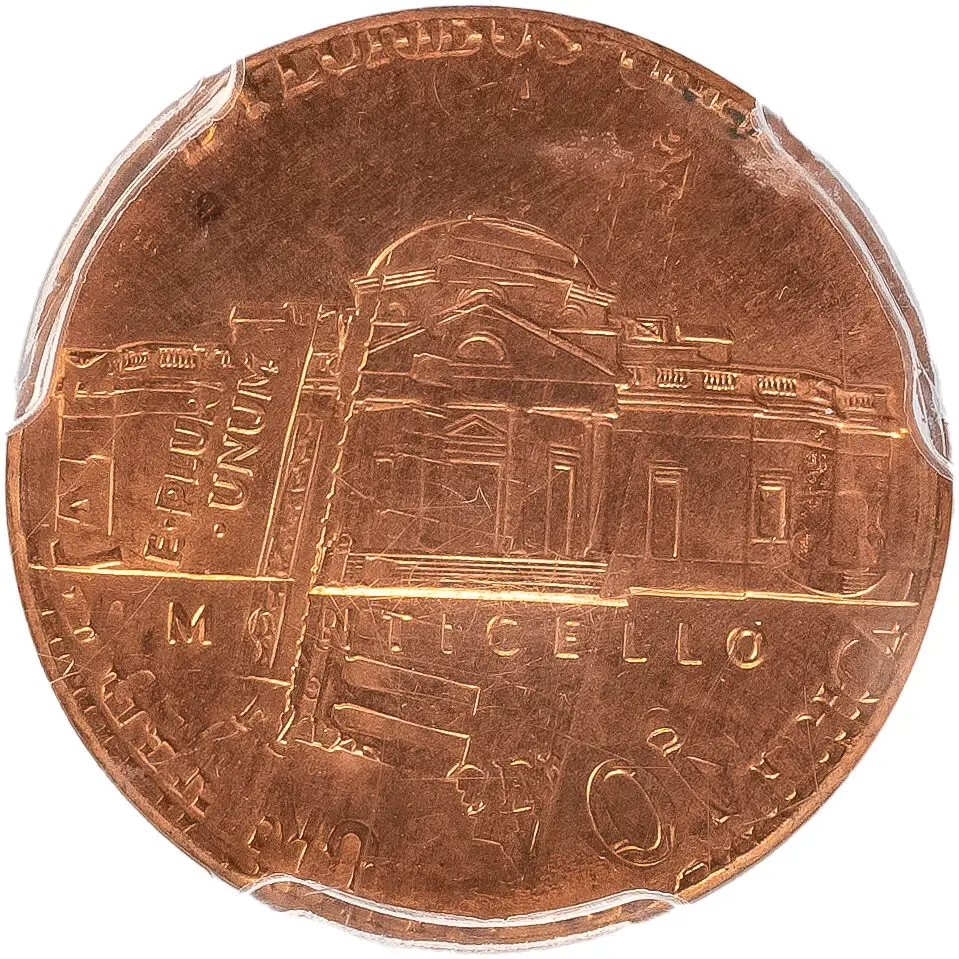1982 Jefferson nickel struck on a copper cent planchet showing wrong planchet error with copper coloring and smaller diameter