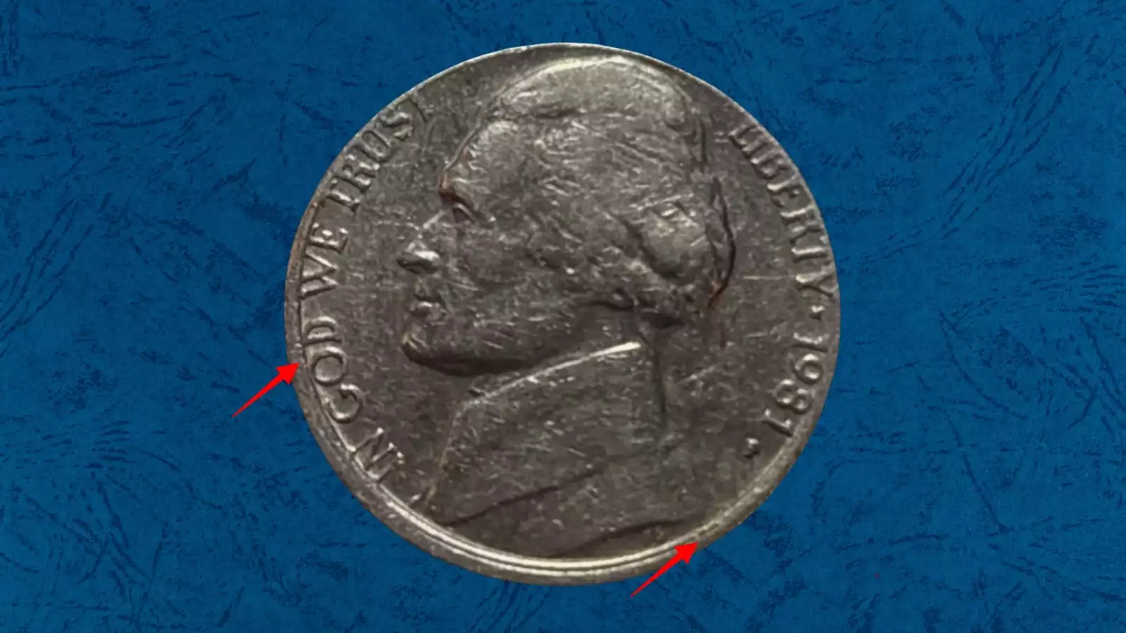 1982 Jefferson nickel off-center strike error showing design displaced 40-50% with blank planchet area and date visible