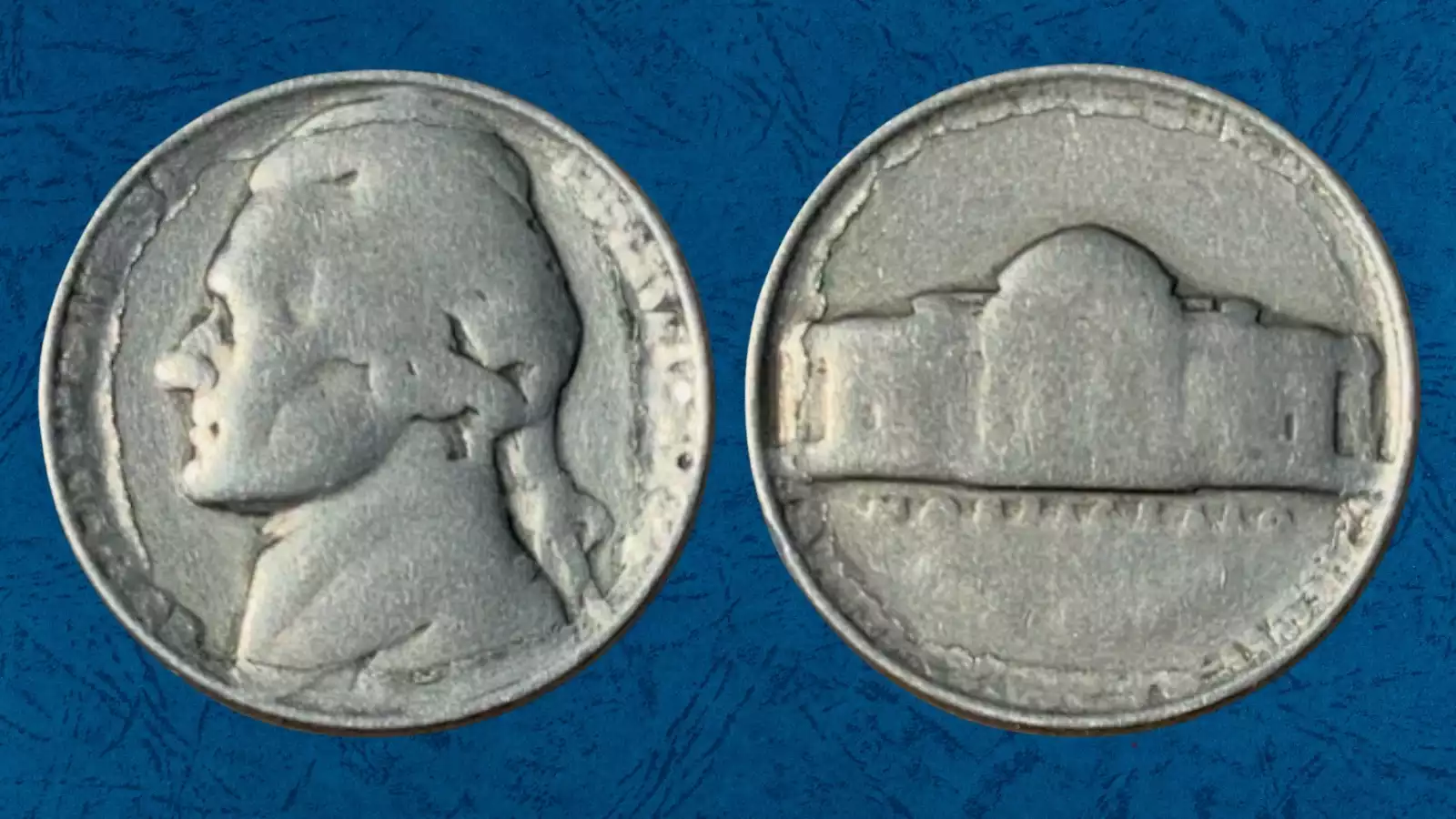 1982 Jefferson nickel filled die grease error showing missing or weak design elements where die grease blocked metal flow